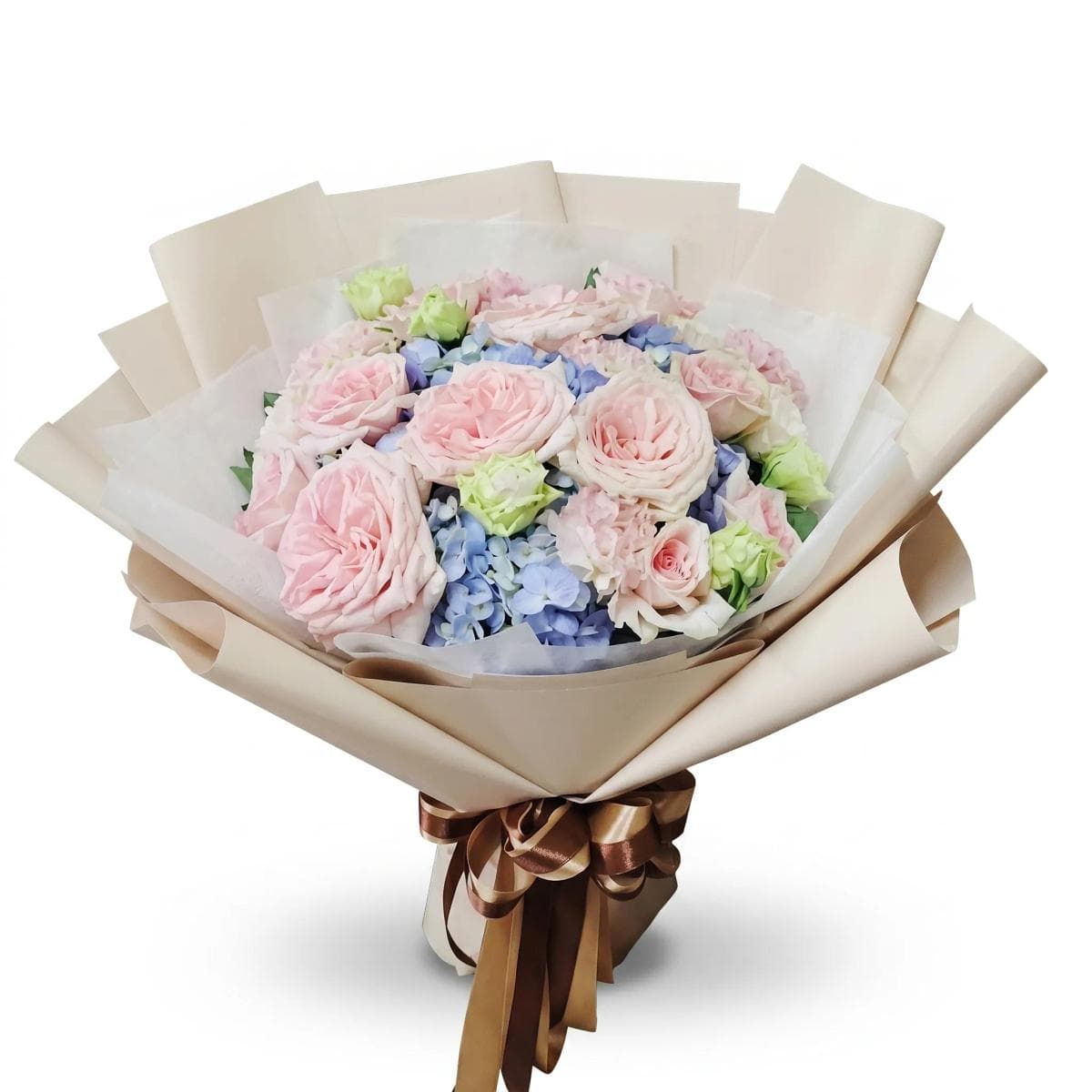 A soft mixed bouquet in white and pastel tones — thoughtfully arranged with seasonal blooms and light greenery for a clean, elegant look. Flower types may vary based on daily availability, while the overall style and color palette stay the same.