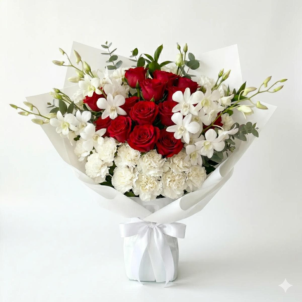45cm flower bouquet with 12 red roses, 30 white orchids, and 15 white carnations in sophisticated white wrapping with metallic gold trim, designed for luxury gifting, grand romantic moments, and premium occasions in Chiang Mai.