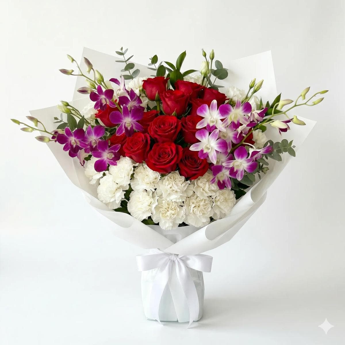 45cm flower bouquet with 12 red roses, 30 white orchids, and 15 white carnations in sophisticated white wrapping with metallic gold trim, designed for luxury gifting, grand romantic moments, and premium occasions in Chiang Mai.