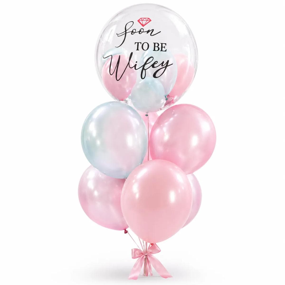 A sweet pastel balloon set for bridal showers, engagement surprises, and pre-wedding celebrations. The design features a clear bubble balloon with “Soon To Be Wifey” lettering, soft pink and pastel blue balloons, and a pink ribbon bow at the base. Perfect for romantic surprises, proposal celebrations, bridal party decoration, and photo corners.