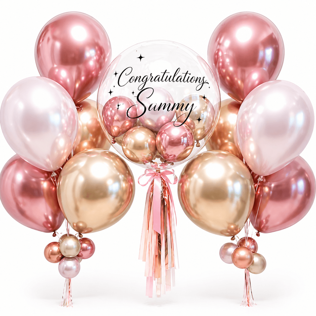 A stylish rose gold birthday balloon arrangement featuring a clear bubble balloon with mini balloons inside, elegant birthday lettering, pink tassel ribbons, and metallic rose gold balloon cluster. A beautiful choice for birthday gifts, romantic surprises, parties, and celebration photos.