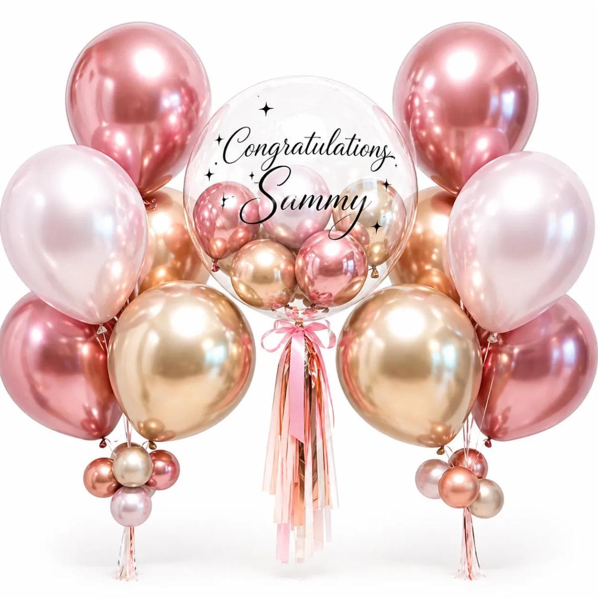 A stylish rose gold birthday balloon arrangement featuring a clear bubble balloon with mini balloons inside, elegant birthday lettering, pink tassel ribbons, and metallic rose gold balloon cluster. A beautiful choice for birthday gifts, romantic surprises, parties, and celebration photos.