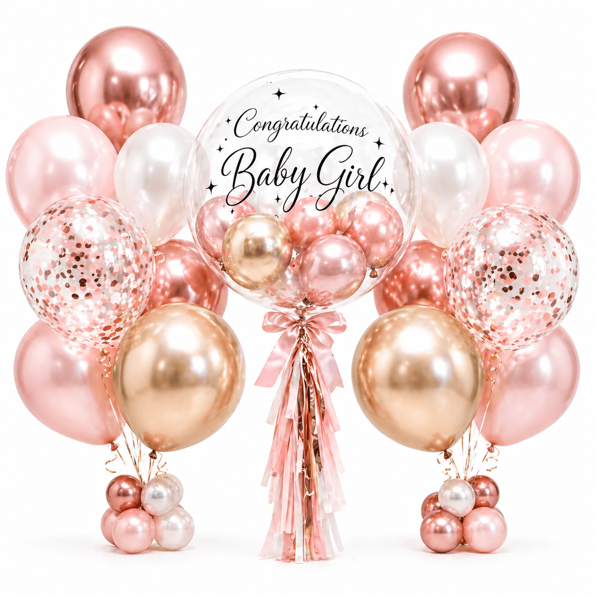 A luxurious Baby Girl balloon arrangement in soft blush pink, pearl white, rose gold, and champagne gold tones. The set features a large clear bubble balloon with elegant “Congratulations Baby Girl” lettering, mini balloons inside, rose-gold confetti balloons, glossy metallic side clusters, and a soft pink tassel ribbon. Perfect for baby showers, newborn celebrations, gender reveal parties, hospital room decoration, and photo corners.