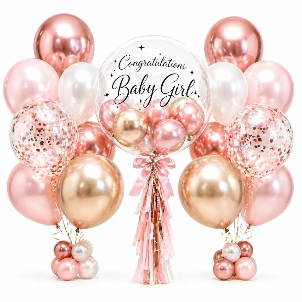 A luxurious Baby Girl balloon arrangement in soft blush pink, pearl white, rose gold, and champagne gold tones. The set features a large clear bubble balloon with elegant “Congratulations Baby Girl” lettering, mini balloons inside, rose-gold confetti balloons, glossy metallic side clusters, and a soft pink tassel ribbon. Perfect for baby showers, newborn celebrations, gender reveal parties, hospital room decoration, and photo corners.