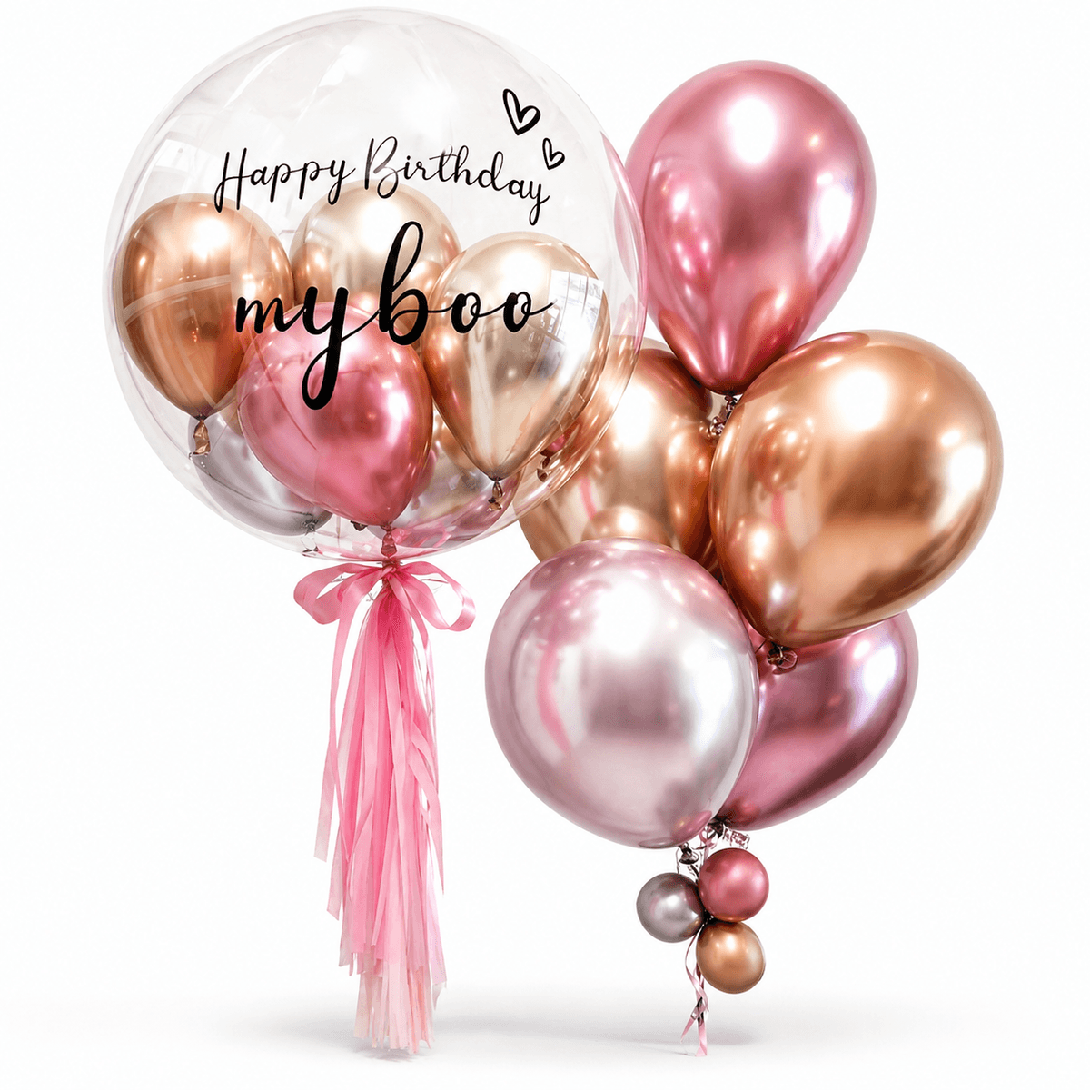 A stylish rose gold birthday balloon set with a large clear bubble balloon, mini metallic balloons inside, “Happy Birthday my boo” lettering, pink tassel ribbons, and a matching rose gold balloon cluster. Perfect for birthday surprises, romantic gifts, party decoration, hotel room setups, and celebration photo corners.